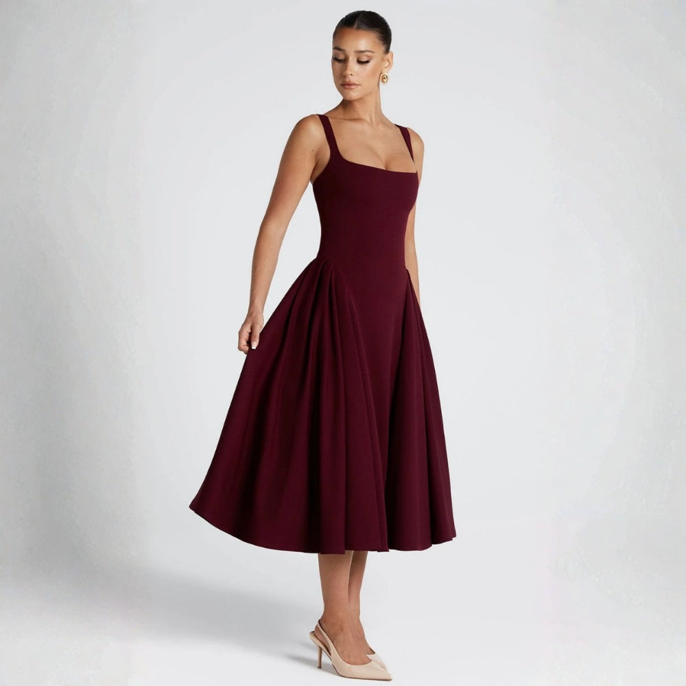 Formal navy midi dress paired with white heels