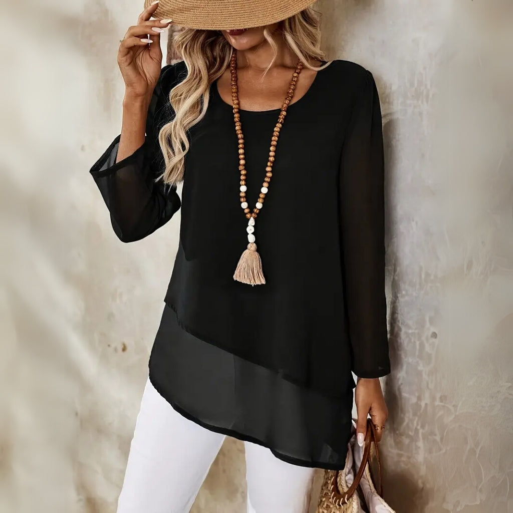 Loose asymmetric hem blouse