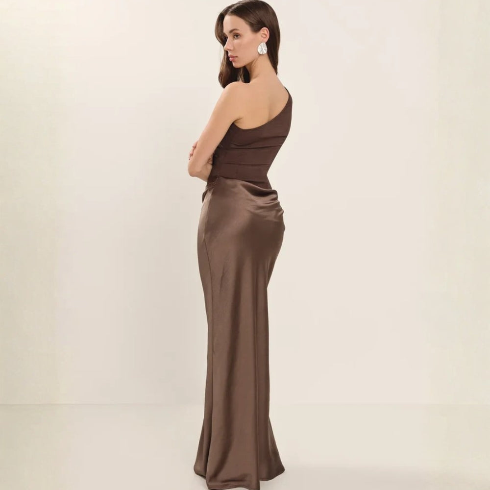Brown formal dress with sleek silhouette and soft draping