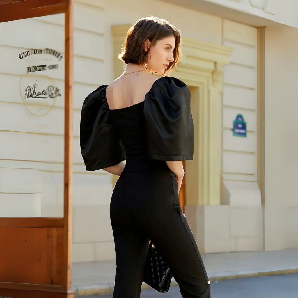 Detail view of puff sleeve and neckline elegant