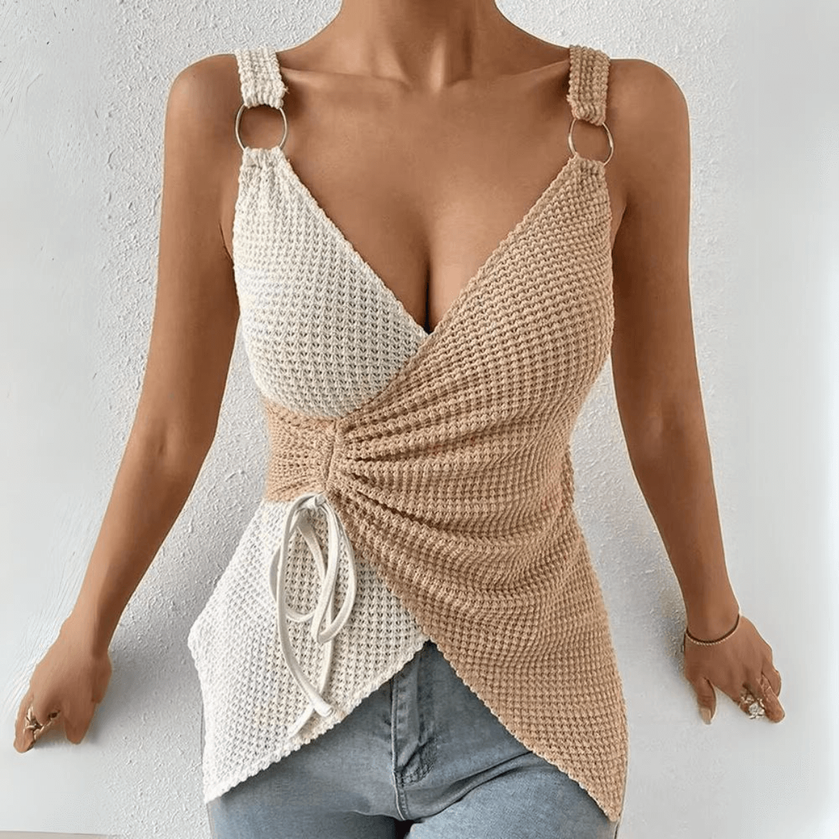 Fitted silhouette of asymmetric wrap top