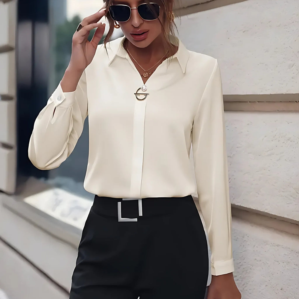 Detail of blouse collar and buttons