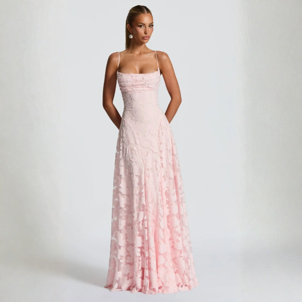 Woman wearing a burgundy floral lace maxi evening dress