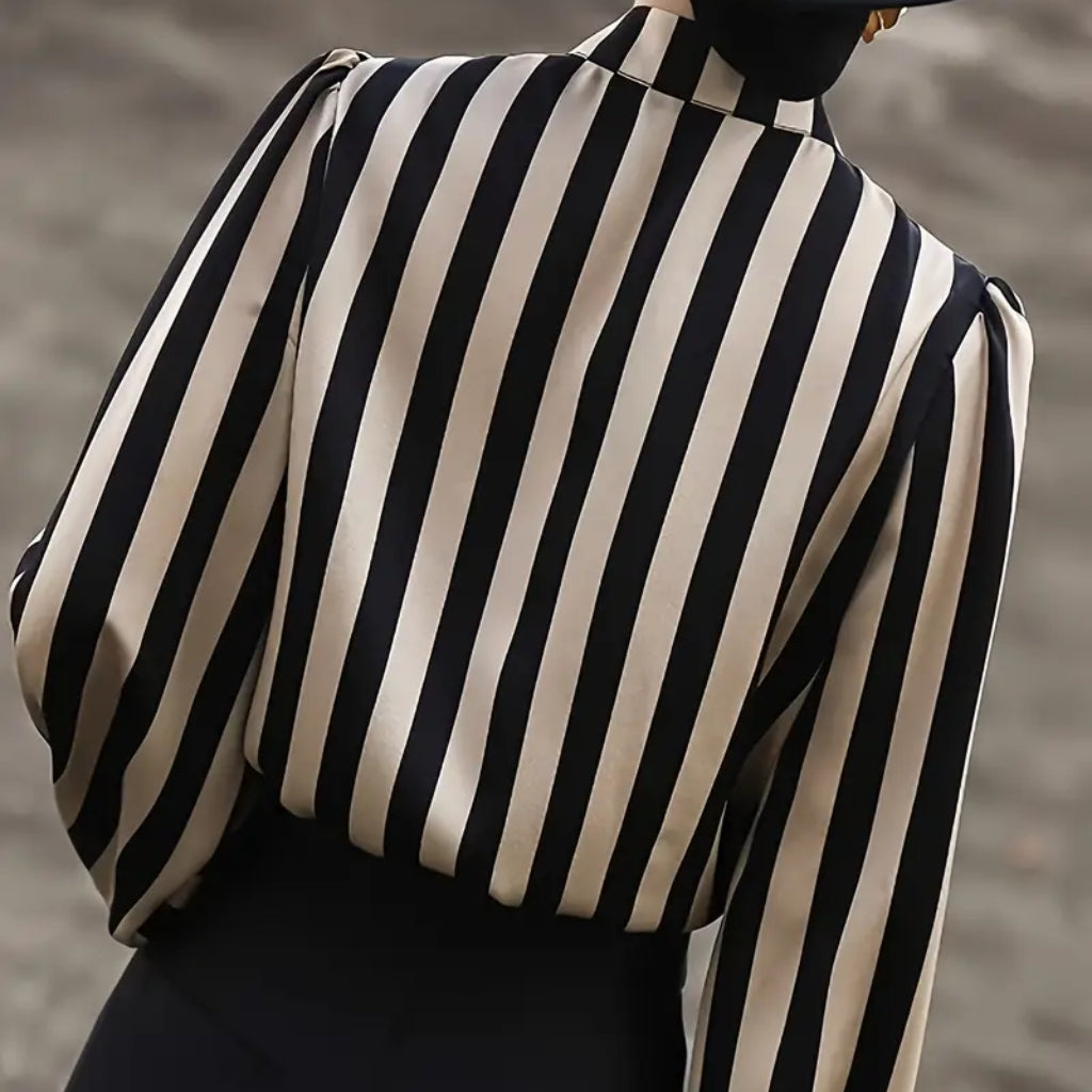 Back view elegant striped blouse