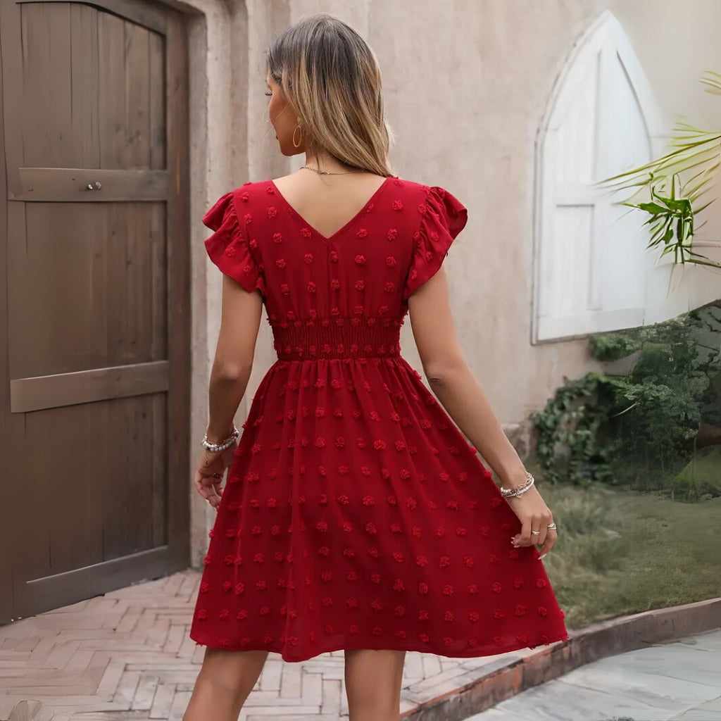A-line red dress with fitted waist and soft fabric