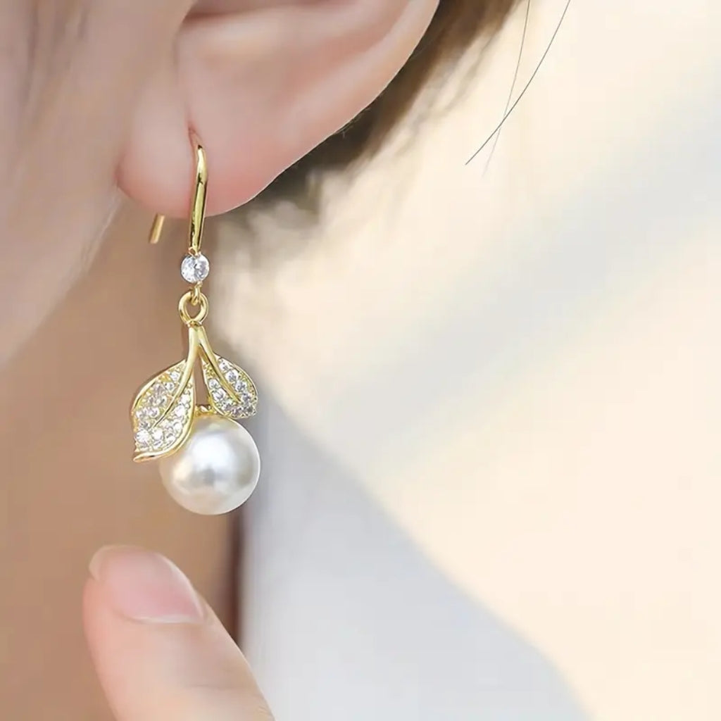 gold leaf drop earrings with pearl for women elegant style