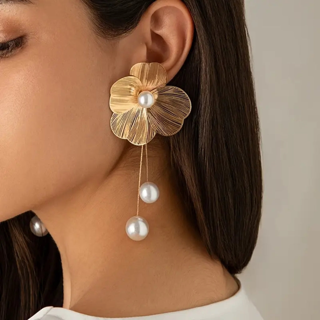 large gold flower drop earrings statement look