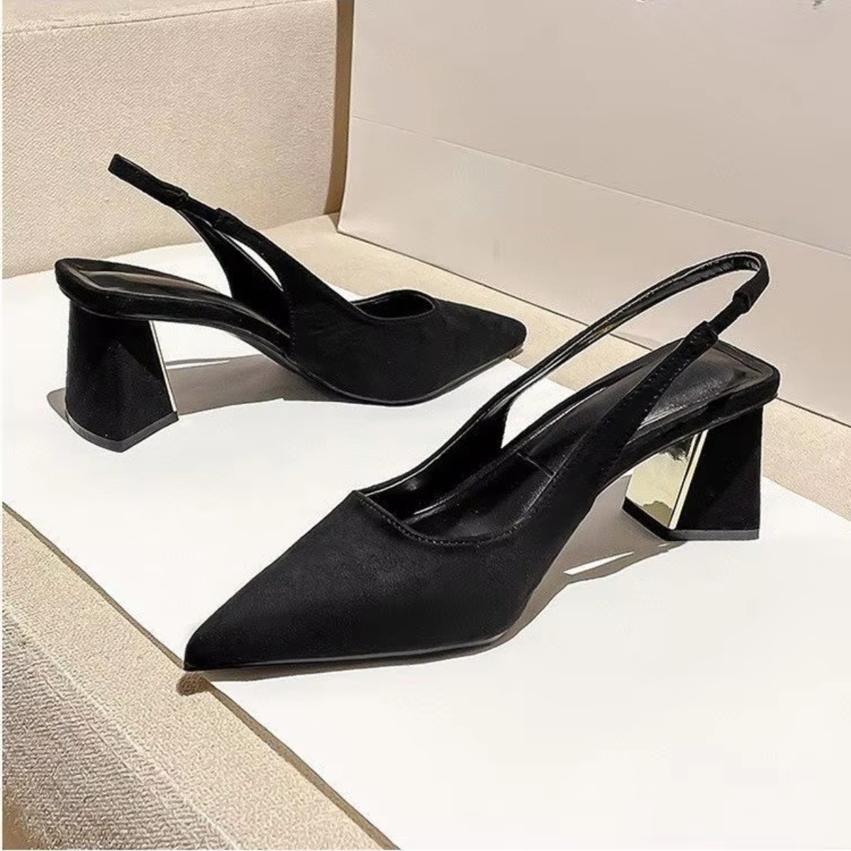 Pointed toe detail of minimalist mule