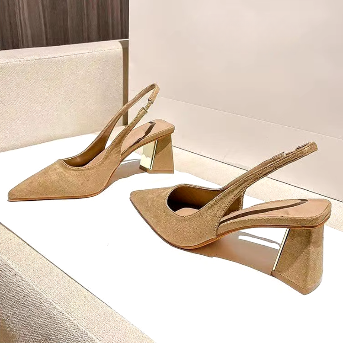 Beige elegant mule pair displayed