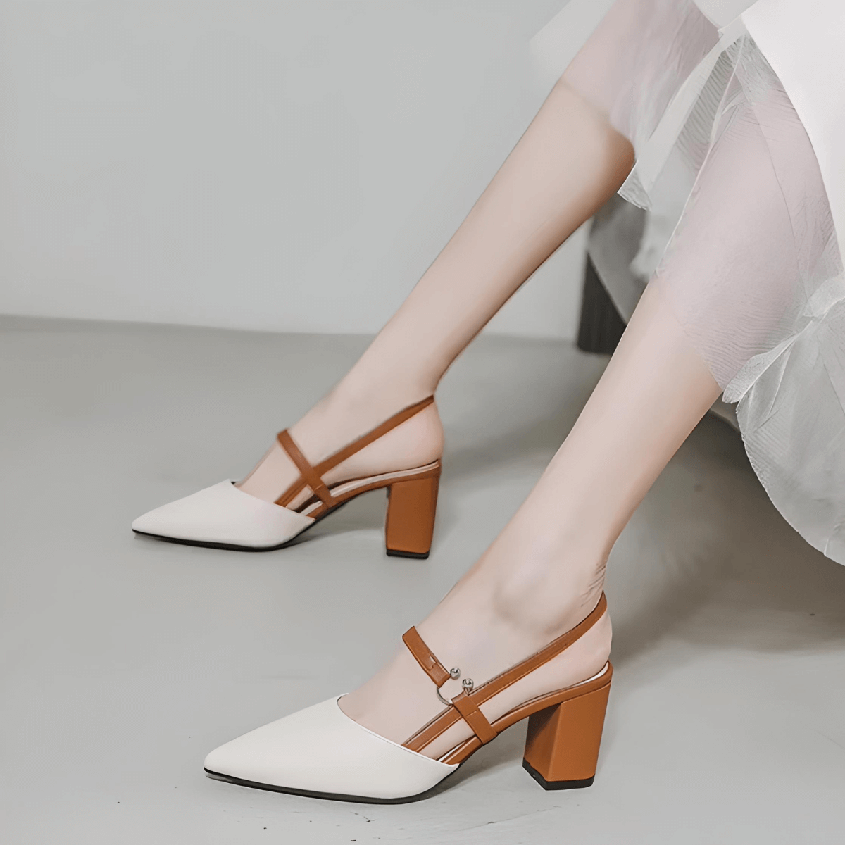Front strap detail on elegant mule