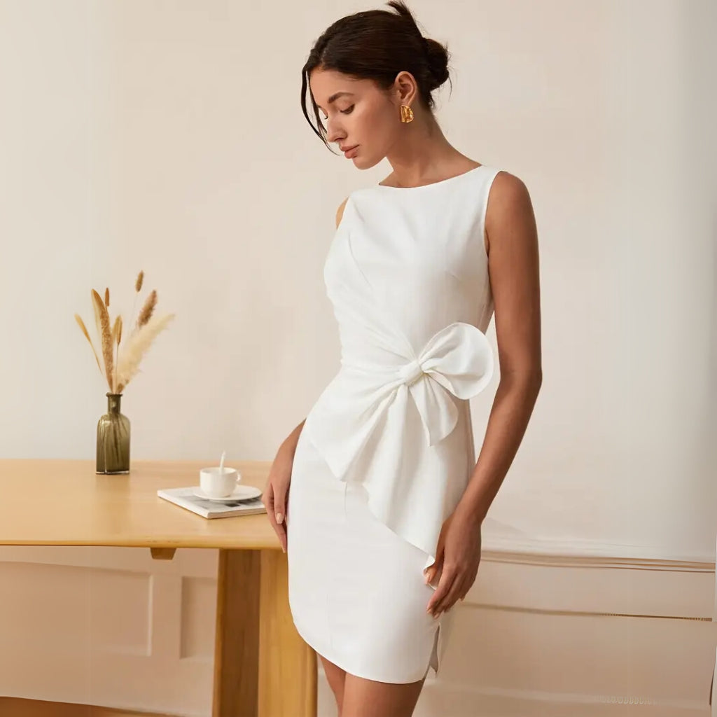 Close view of draped waist white dress