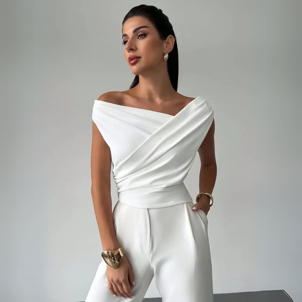 Detail view of draped shoulder blouse